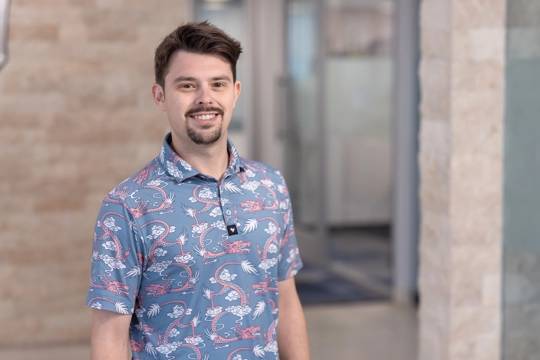 portrait of a smiling person in professional attire